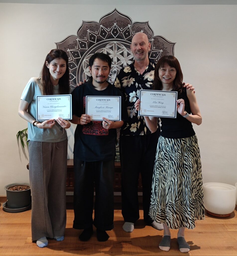 Students receiving certificates after completing Akashic Records Level 1 training with Neil